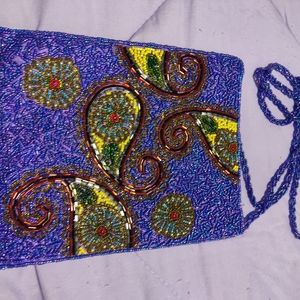 Beautiful beaded shoulder strap evening bag